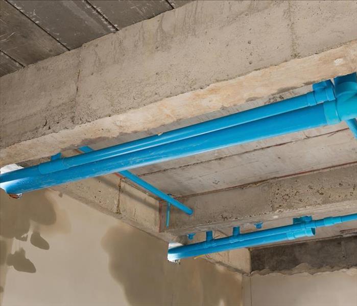 Image of water pipes in a crawlspace